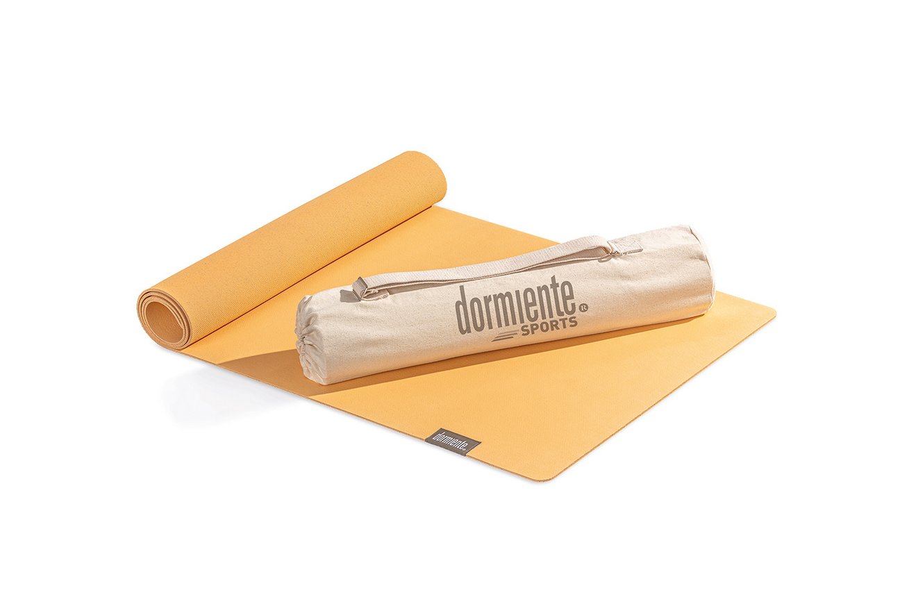 dormiente Yoga Matten aus Naturmaterialien in verschiedenen Farben.